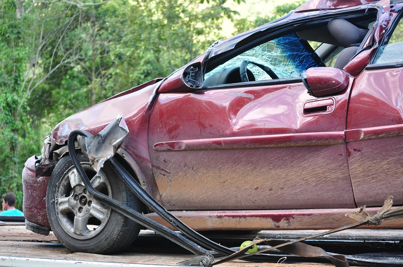 Damaged box truck after highway accident showing collision impact