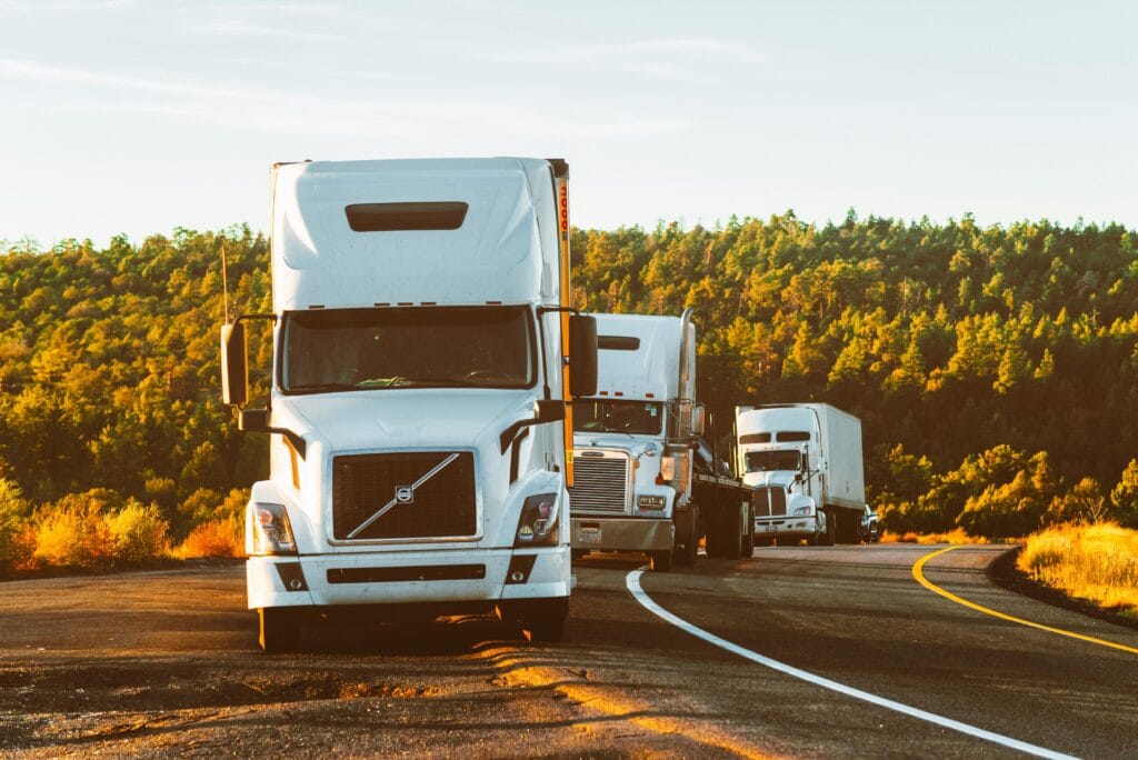 Truck Accident Attorneys near me. 3 trucks on road